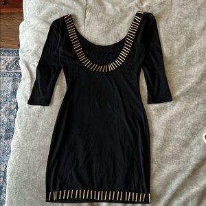 Chic Black Dress with Gold Detailing